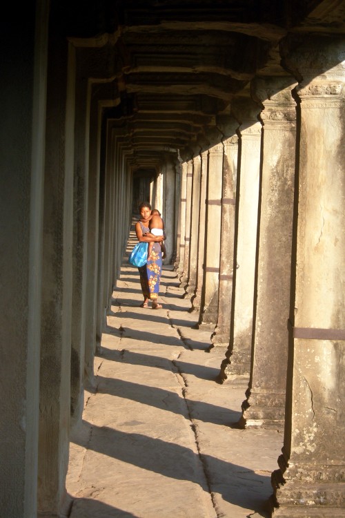 A Woman and Her Baby at Angkor Wat